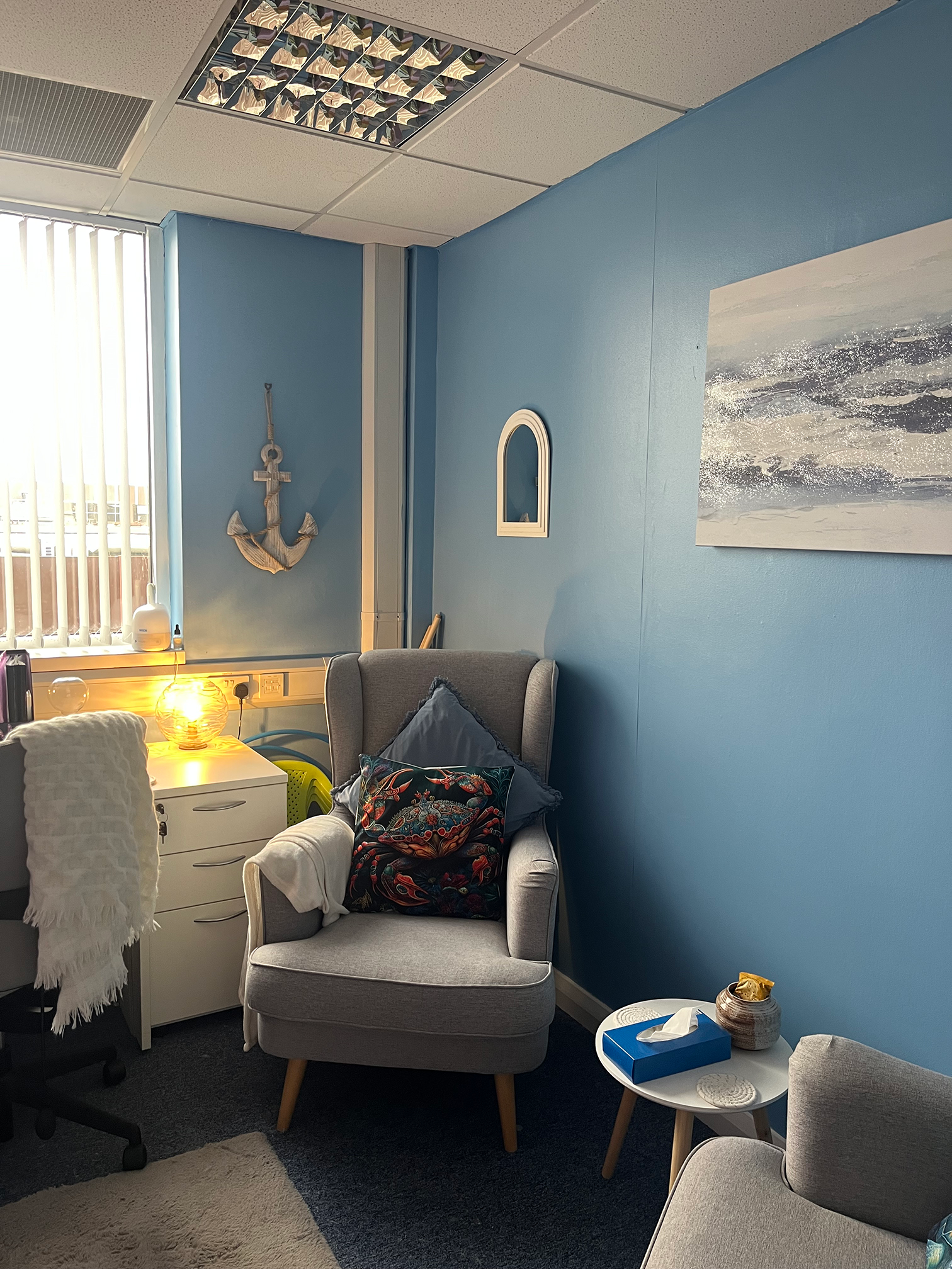 Therapy office interior showing a peaceful, ocean-themed space