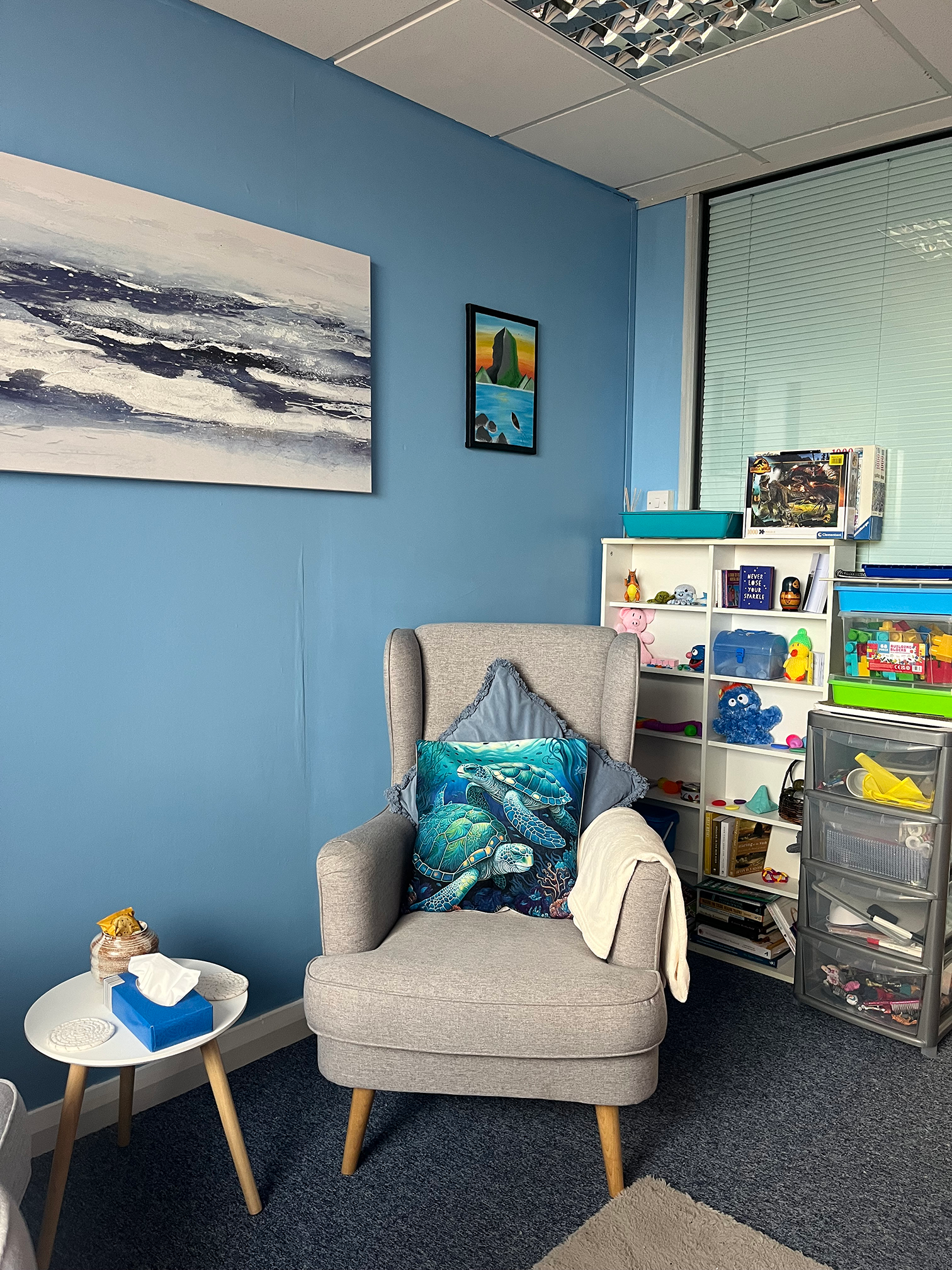 Therapy office interior showing a peaceful, ocean-themed space