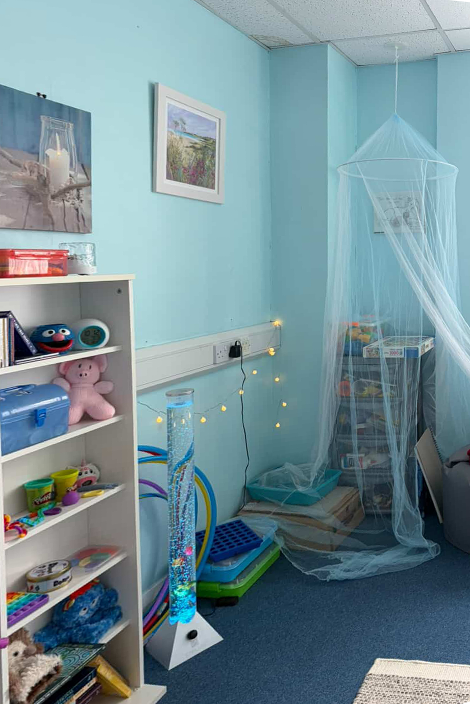 Therapy office interior showing a peaceful, ocean-themed space